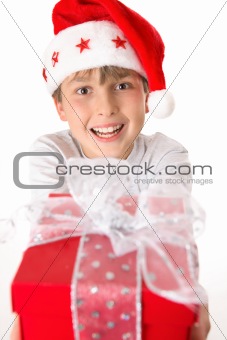 Festive child holding a present