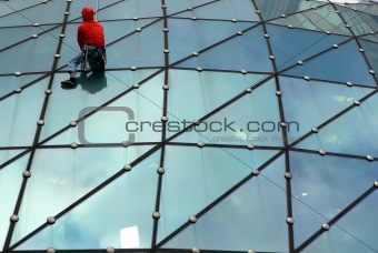 Climber on glass roof 