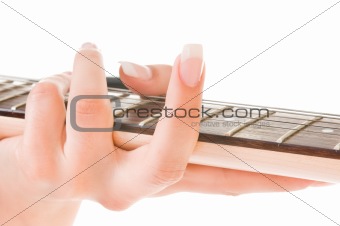 hands and fingers with a guitar 