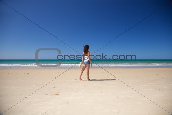 side woman walking at Zahara beach