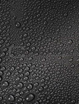 Water drops on a metallic background