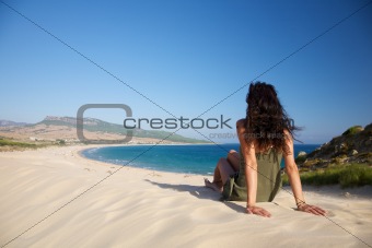sitting over Bolonia beach