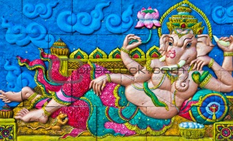 Statue of Ganesh on the wall.
