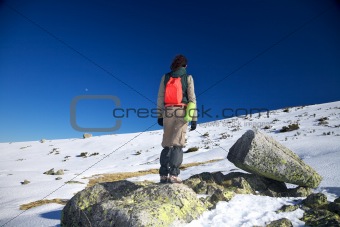 active woman on rock