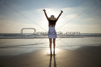 happy woman against sun