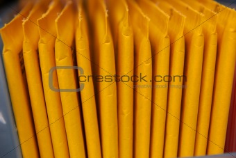 Yellow Stuffed Envelopes in a Row