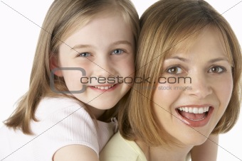 Mother And Daughter Smiling