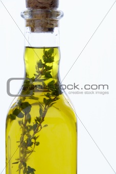 Bottle Of Olive Oil With Herbs