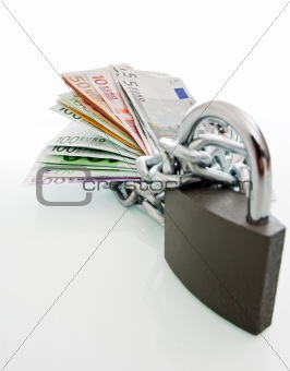 Banknotes chained and locked