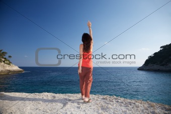 happy woman on red at Menorca