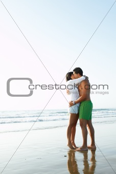 adorable  couple in love kissing and embracing each other