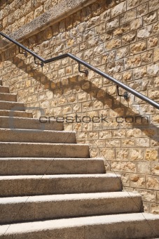 stone steps with metal banister