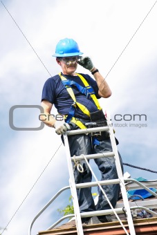 Man working on roof