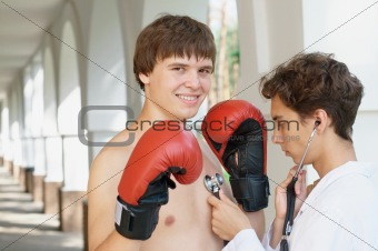 Doctor checking a boxer