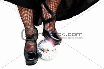 dancers legs with disco ball