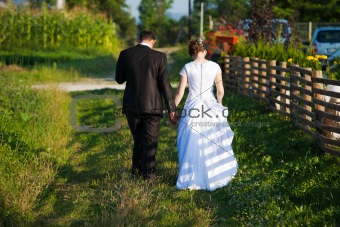 Young married couple walking