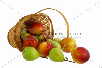 Fresh fruits spilled from interwoven basket