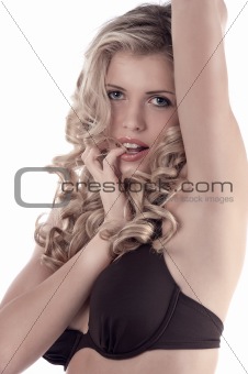 portrait of a curled blonde in bikini