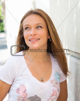 attractive woman outdoors portrait of thinking woman 
