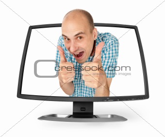 man making thumbs up sign through a monitor screen