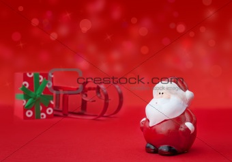 Santa Claus with sledge and present