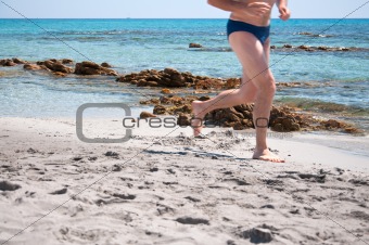 Man rushes on the beach