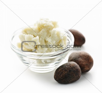Shea butter and nuts in bowl