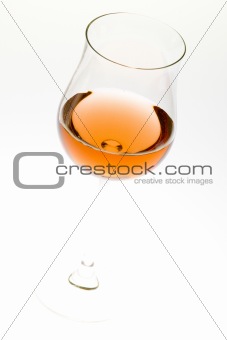 wineglass with rosé wine