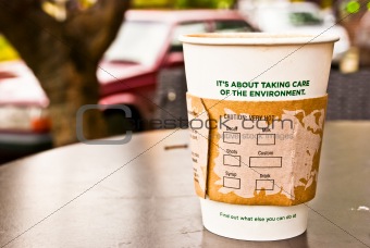 a cup of hot coffee in paper cup for the environment
