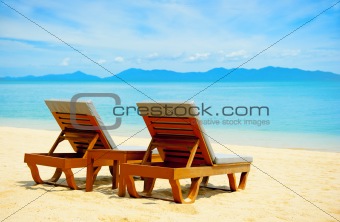 Chairs on the beach near with sea