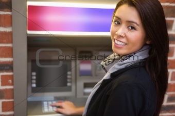Woman withdrawing cash