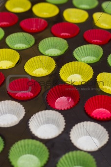 Vibrant cupcake wrappers (backing cups) in silicon/metal  tray