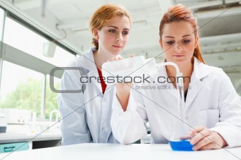 Scientists doing an experiment