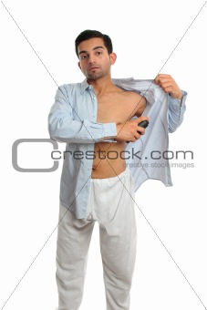 Man using underarm deodorant perspirant spray