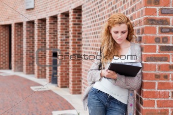 Young student reading her notes