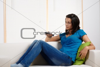 woman lying on a couch