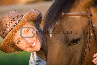 Woman embrace brown horse