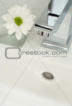 Chrome tap water and flower