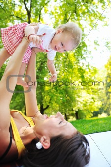 woman and baby have playing at park
