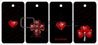 Black tags with heart shaped gemstones