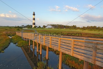 Walkway over a marsh to the Bodie Island lighthouse