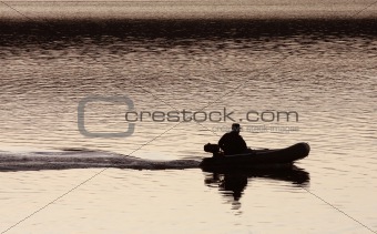 silhouette of a man in a boat(1).jpg