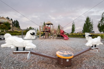 Neighborhood Public Park Children's Playground with Seesaw
