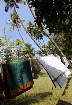 wind blown clothes washing Kerala India