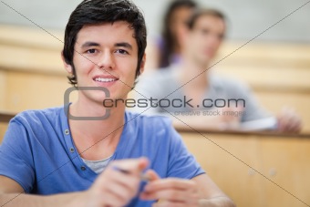 Student listening to a lecturer