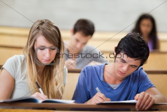 Students taking notes