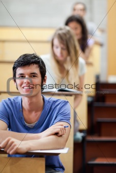 Portrait of young students during examination