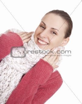 Beautiful woman in winter sweater and scarf