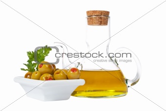 Oilcan and olives with parsley