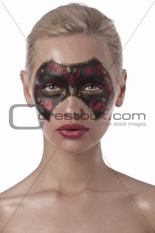 carnival mask painted on face